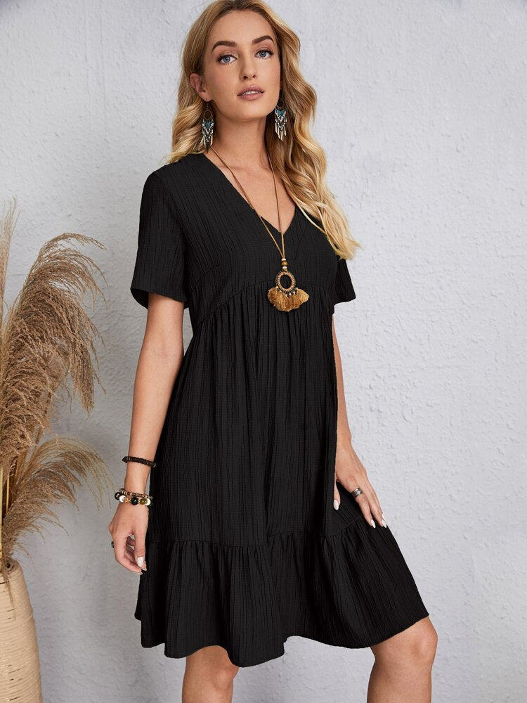 RIYA - V-neck midi dress